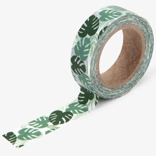 A roll of Daily Like washi tape, featuring monstera leaves on a white background