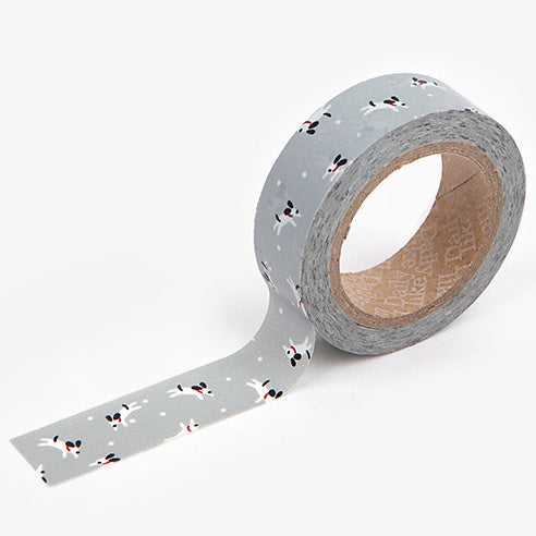 A roll of Daily Like washi tape, featuring playing puppies on a grey background