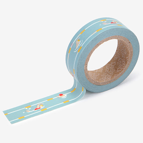 A roll of Daily Like washi tape, featuring a swimming pool with people swimming