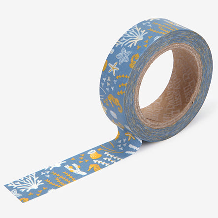 A roll of Daily Like washi tape, featuring seahorses and sea life on a blue background