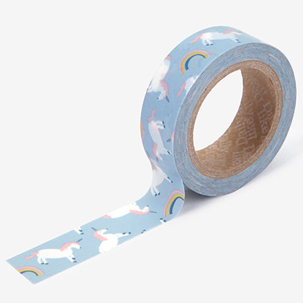 A roll of Daily Like washi tape, featuring unicorns and rainbows on a sky blue background