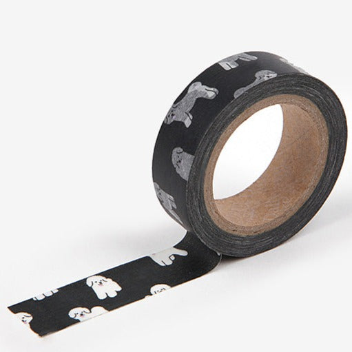 A roll of Daily Like washi tape, featuring white Bichon Frise dogs on a black background