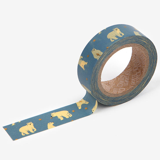 A roll of Daily Like washi tape, featuring polar bears on an ocean blue background