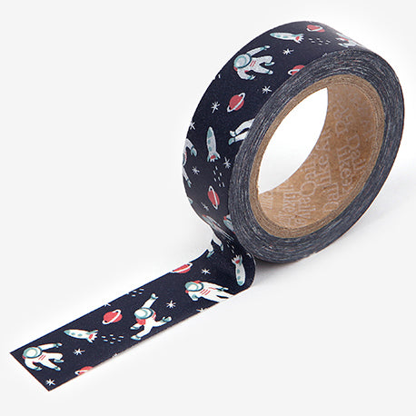A roll of Daily Like washi tape, featuring astronauts and rocketships amongst stars and planets